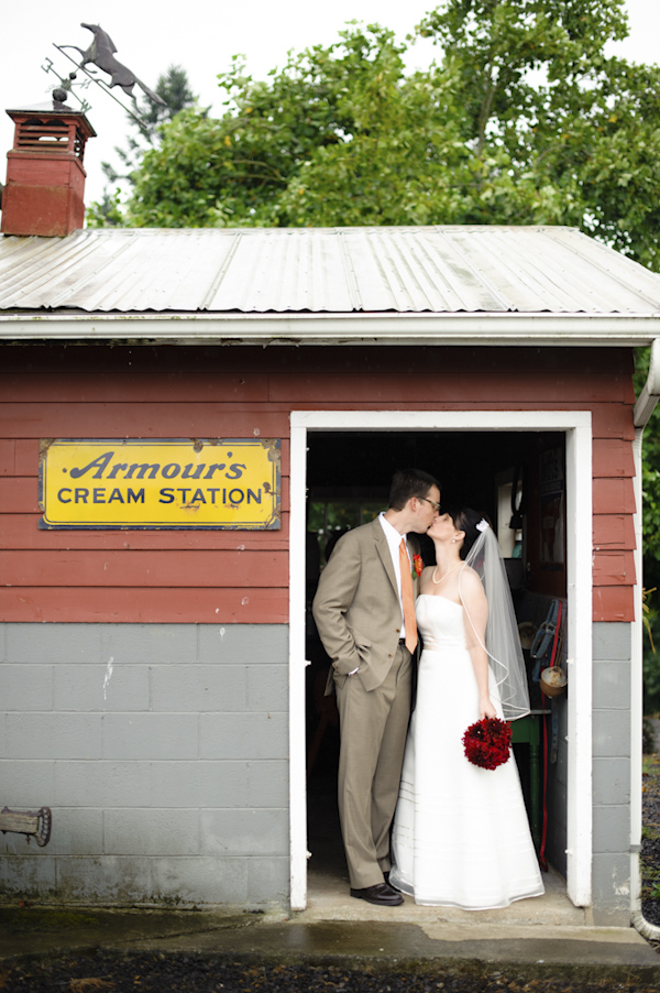 the newlywed kissing in cream station - wedding photo by top Portland, Oregon wedding photographer Aaron Courter